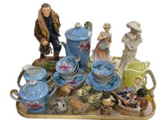 Ashmor figure of RAF pilot, Royal Crown Derby duck, five Royal Worcester and Copenhagen birds,