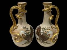 Pair of Continental vases with rooster decoration and lizard handles, 25cm.