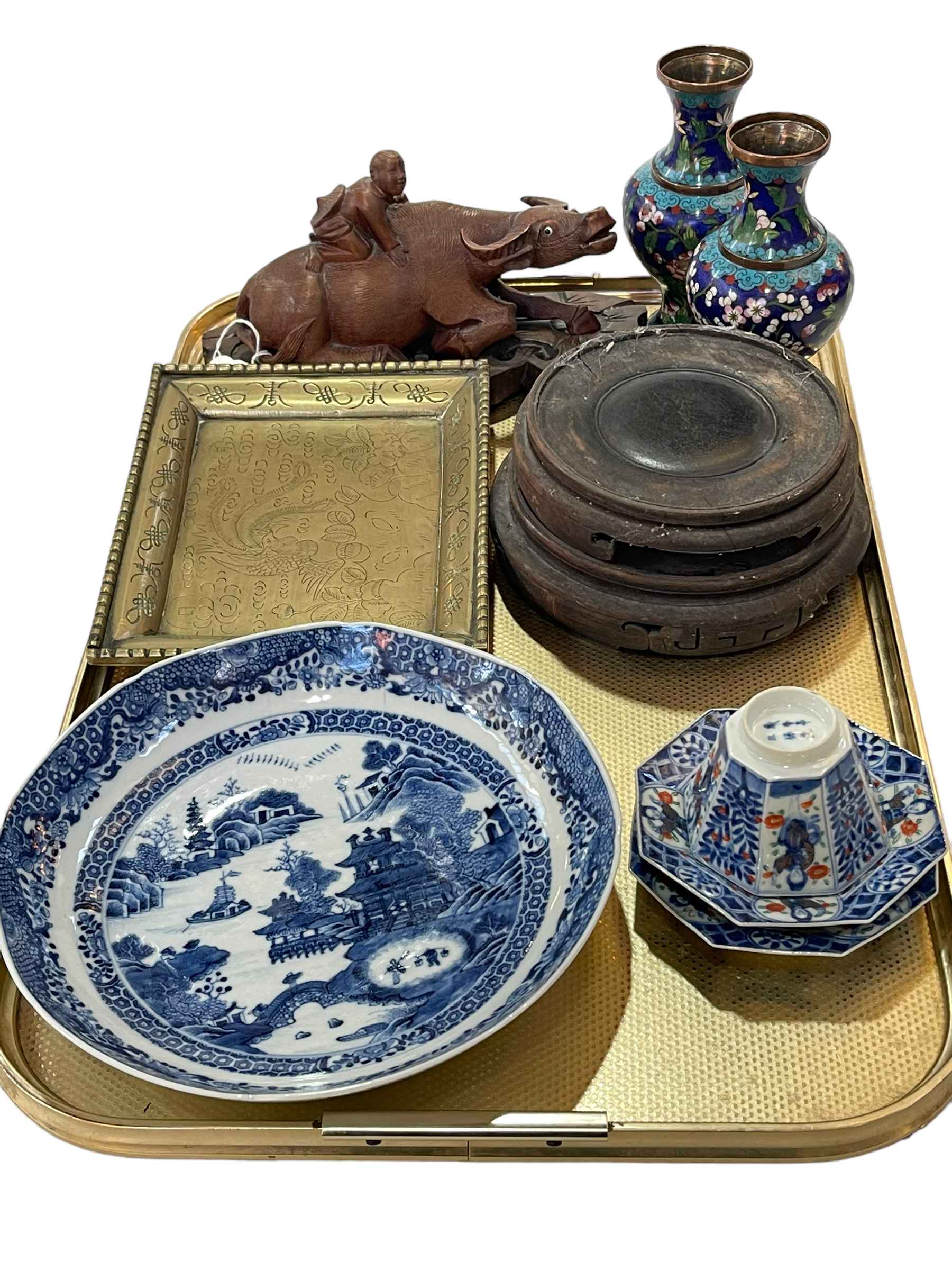 Pair of Cloisonné vases, carved buffalo on stand, blue and white Chinese plate, tea bowl and saucer,
