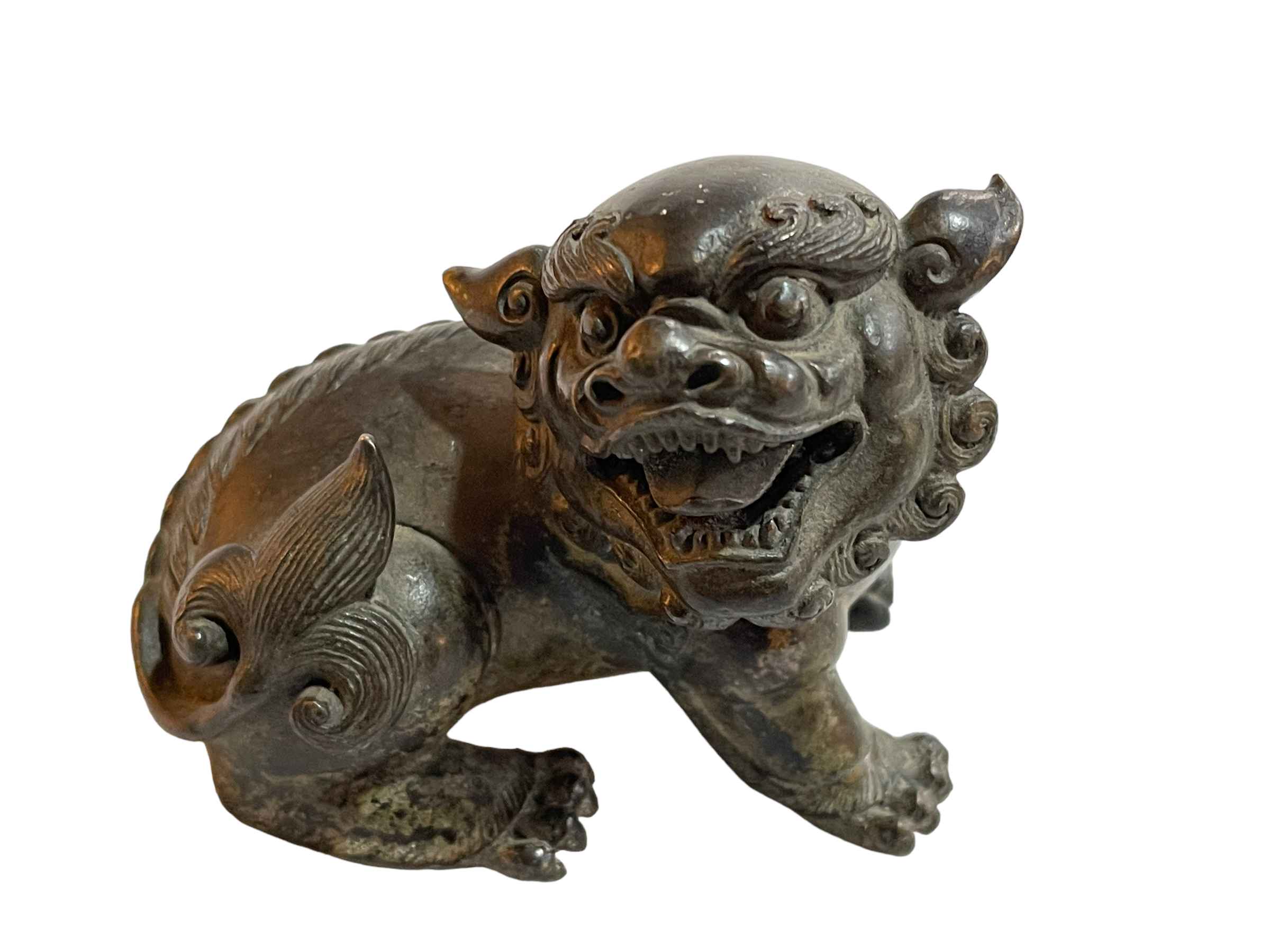 Small Oriental bronze dog of fo.