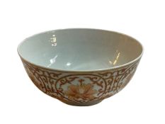 Chinese pottery bowl decorated with external floral pattern and internal bats,