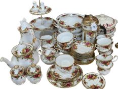 Forty pieces Royal Albert Old Country Roses dinner and teawares and two Meakin tureens.