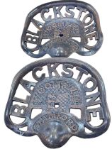 Two cast metal models of Blackstone Company Ltd tractor seats.