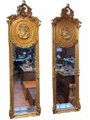 Pair gilt framed lady portrait bevelled wall mirrors, 180cm by 52cm.