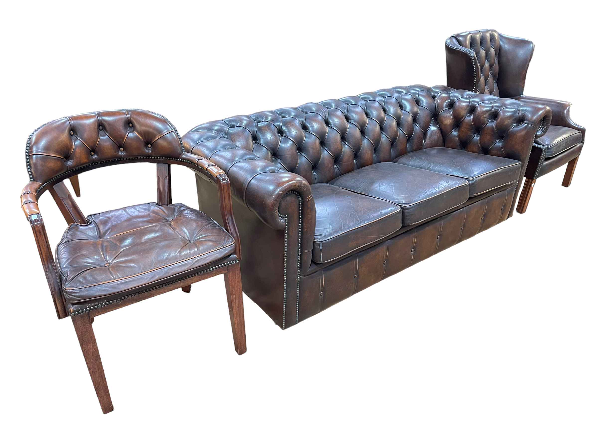 Brown deep buttoned leather three seater Chesterfield settee and wing armchair together with a - Image 2 of 2