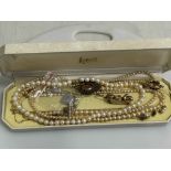 Uniform pearl necklace with 9 carat gold clasp, 40cm length, and other jewellery including gold.