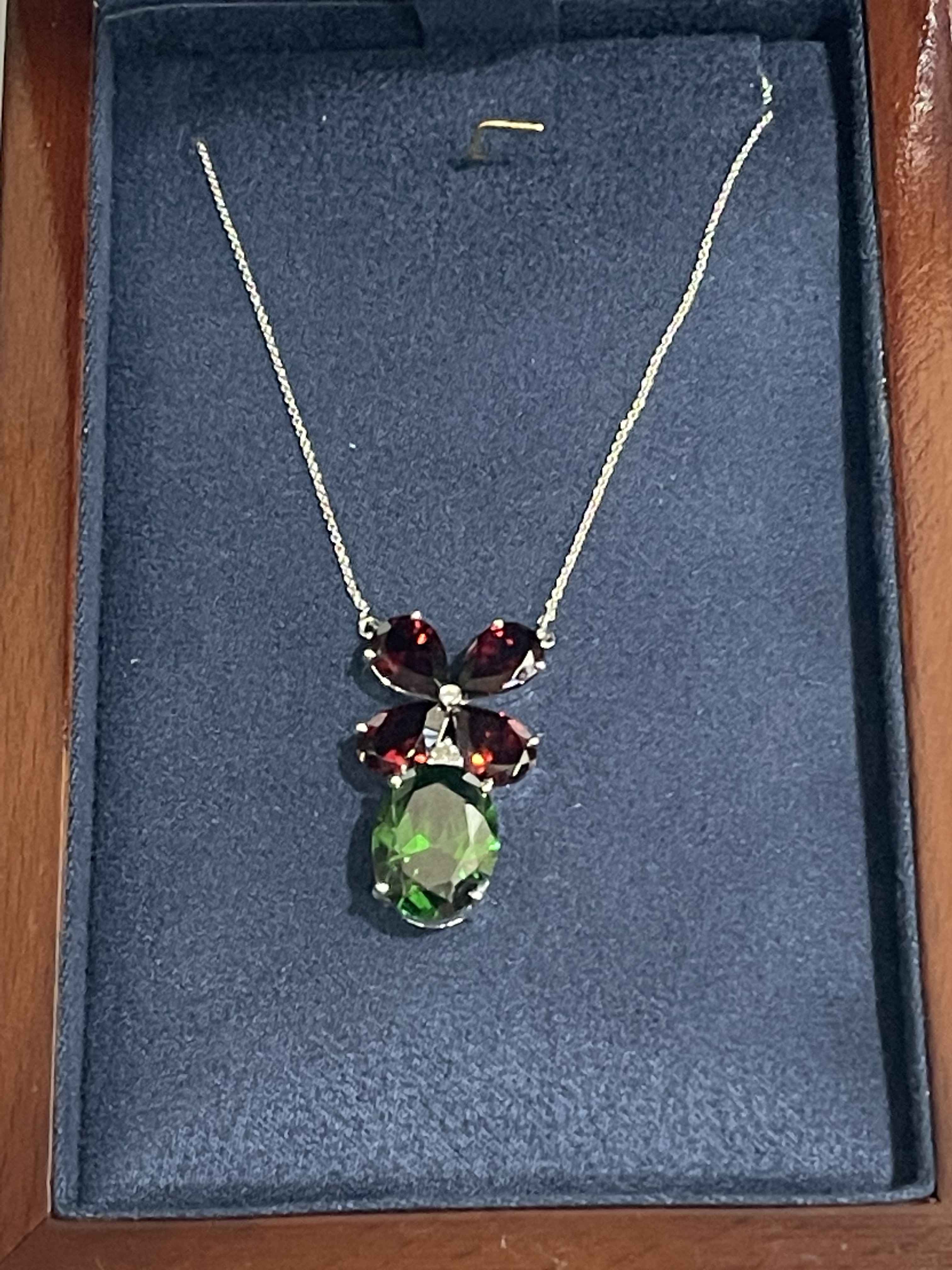 Gem stone and 18 carat white gold necklace.