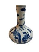 Chinese blue and white dragon vase with four character mark, 22cm.