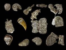 Collection of seventeen novelty vesta cases including skull, Punch, violin, whistle, Ally Sloper,