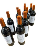 Eleven bottles of Chateau Pierbone Haut Medoc 2010 red wine.