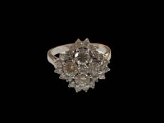 Good quality 18 carat white gold and diamond cluster ring,