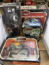 Collection of Star Wars toys including Millennium Falcon Spaceship,