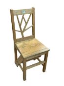 Bespoke light oak metamorphic library chair.