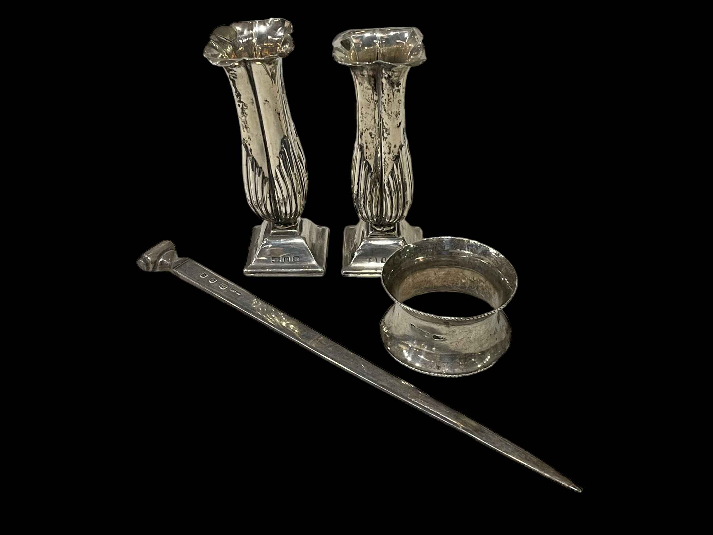 Small pair of silver vases, silver napkin ring and letter opener.