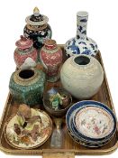 Collection of Oriental wares including blue and white dragon vase, ginger jars, lidded vases, etc.