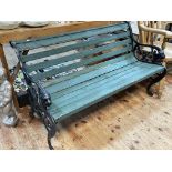 Cast and wood slat garden bench with lion mask arm terminals, 73.5cm by 126cm by 65cm.