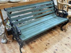 Cast and wood slat garden bench with lion mask arm terminals, 73.5cm by 126cm by 65cm.