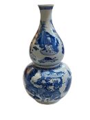 Large Chinese double gourd vase decorated with figures and landscape scenes, 41cm high.