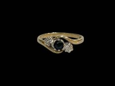 Twist design sapphire and diamond 9 carat gold ring, size O.