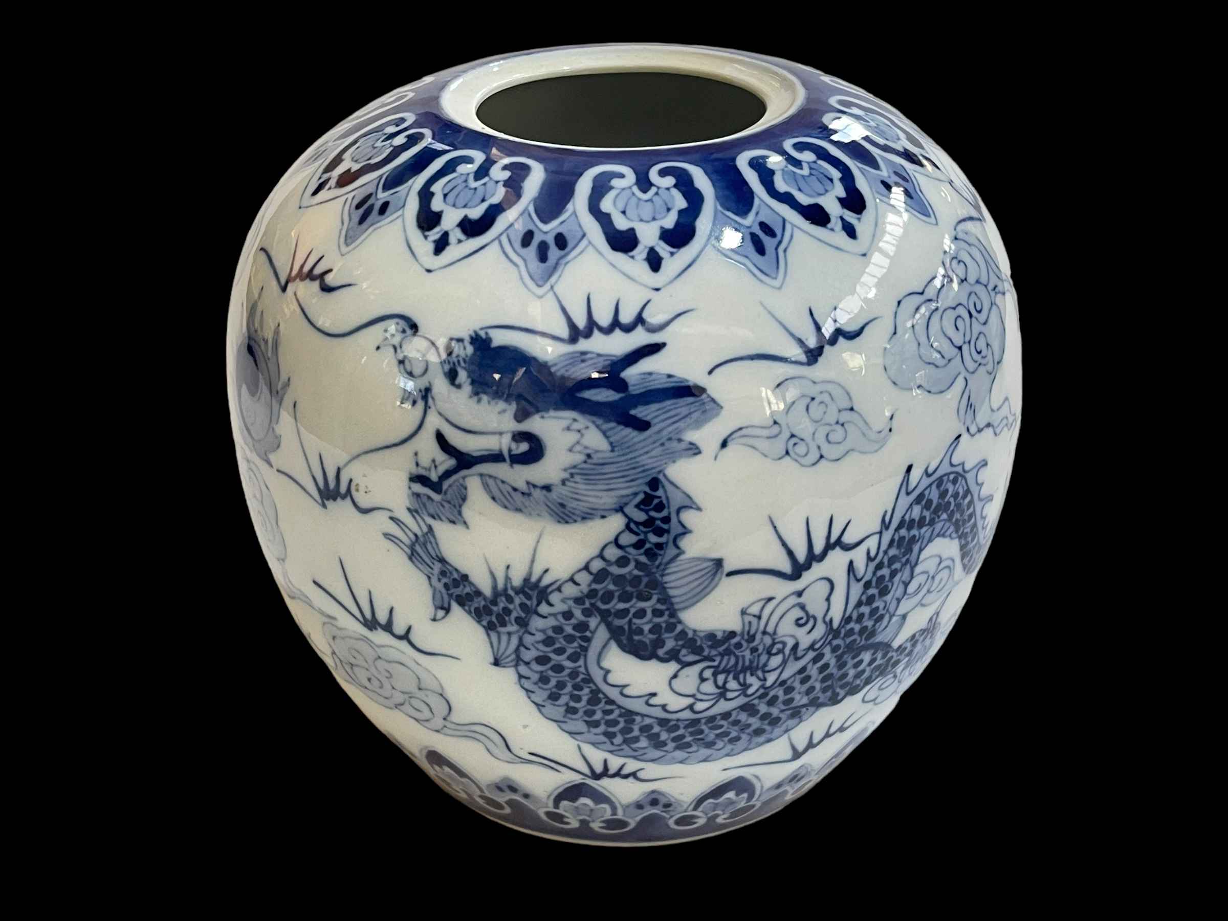 Large Chinese bulbous blue and white vase decorated with two dragons chasing the flaming pearl,
