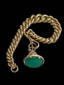 9 carat gold link chain and green hardstone fob.