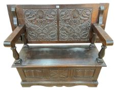 Carved oak Monks bench, 79.5cm by 122cm by 50cm (closed).