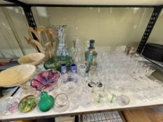 Collection of cut glass and coloured glass including paperweights, comports, decanters,