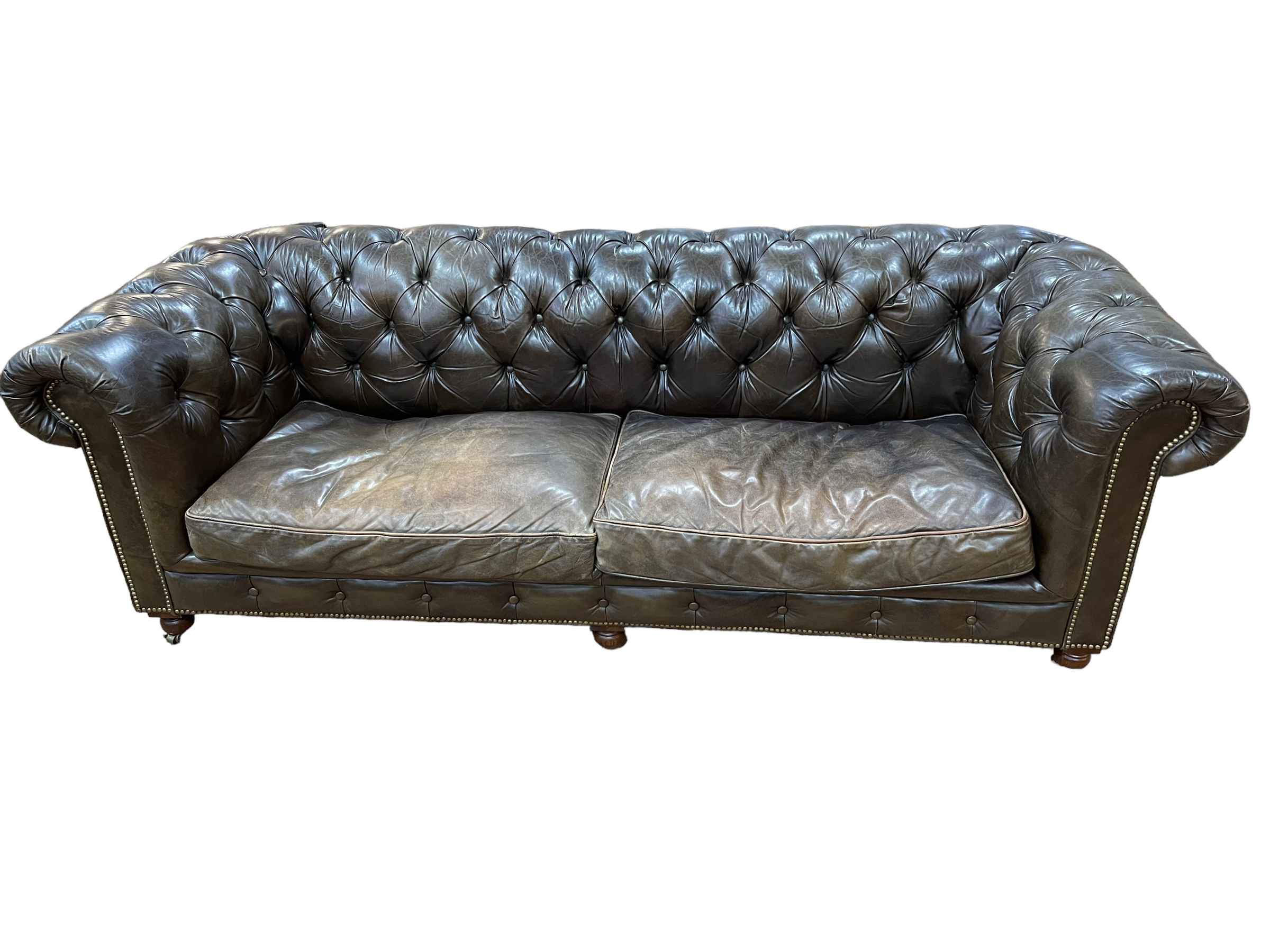 Brown deep buttoned leather and studded Halo Chesterfield settee, 78cm by 240cm by 93cm.