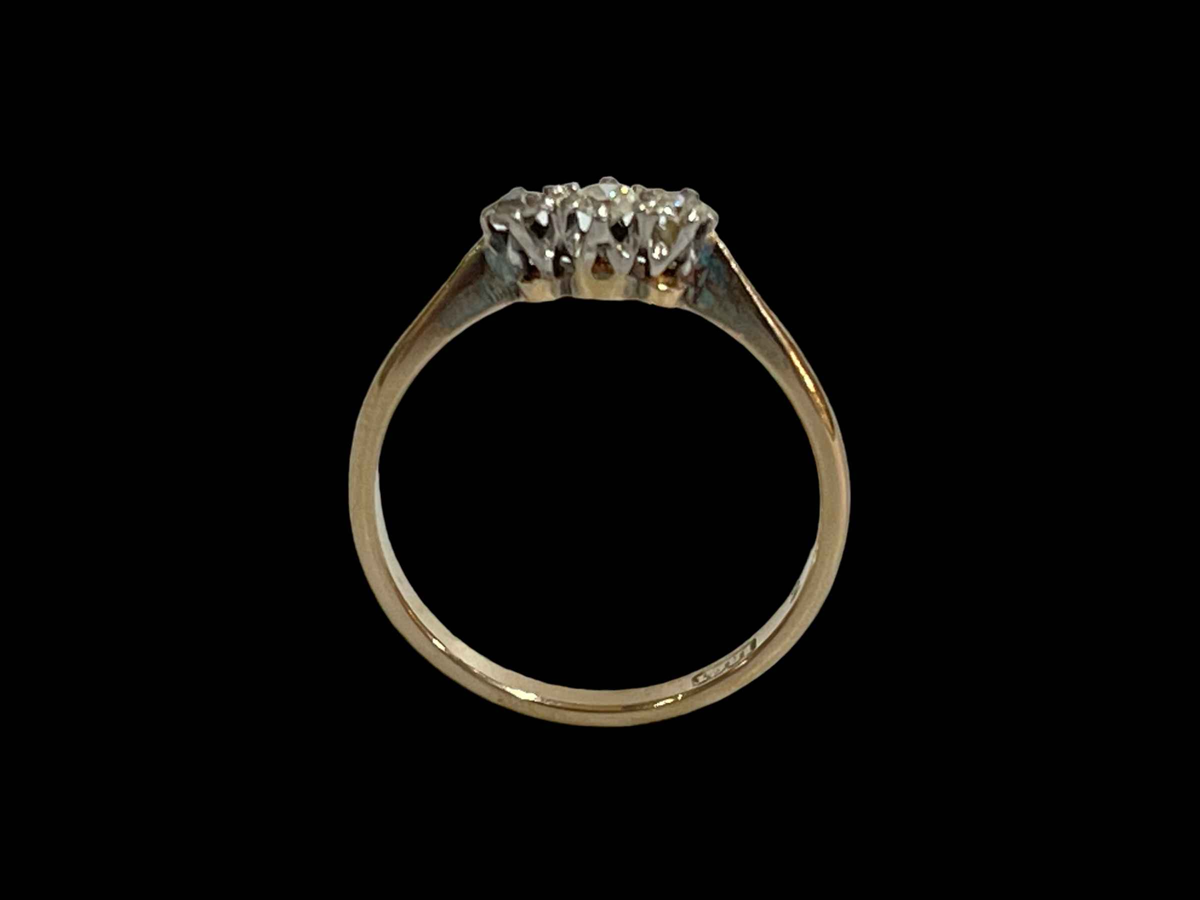 Three stone diamond 18 carat gold ring, size P. - Image 2 of 2