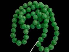 Jade bead necklace.