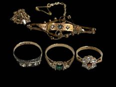9 carat gold brooch, chain link bracelet and three rings.