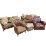 Three piece brown leather and polished wood lounge suite comprising two seater bed settee,