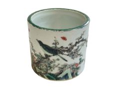 Chinese Famille Verte brush pot decorated with birds in landscape, 11.5cm high, 12.5cm diameter.