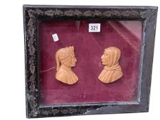 Pair of antique wax profiles in glazed frame, 31.5cm by 36cm, including frame.