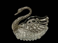 Glass and silver swan.