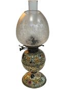 Victorian foliate pattern porcelain oil lamp with etched glass shade, 55cm.