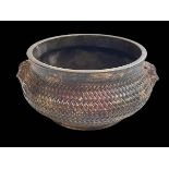 Chinese bronze incense burner cast with a basket weave design, twin lion mask handles,