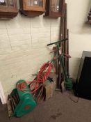 Webb electric lawn mower and collection of garden tools and clamps.