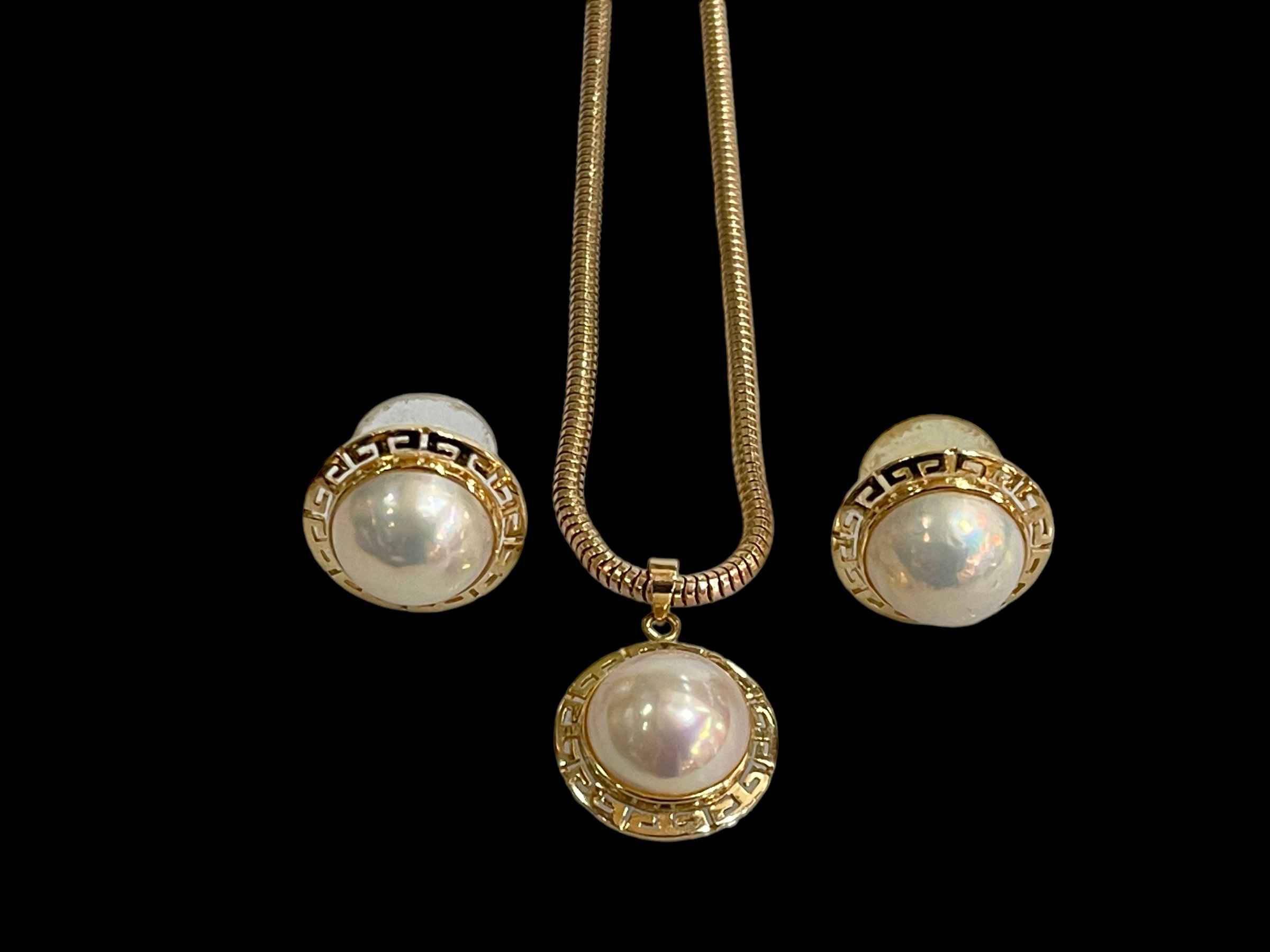 9 carat gold snake chain with pearl style pendant and pair matching earrings.