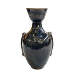 Oriental black glazed vase, 25cm high.