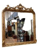 Large gilt framed bevelled overmantel mirror,