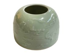 Chinese Celadon brush washer with raised decoration of bats in flight, 7cm high,