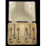 Boxed set of six silver and enamel commemorative spoons, circa 1935.