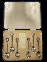 Boxed set of six silver and enamel commemorative spoons, circa 1935.