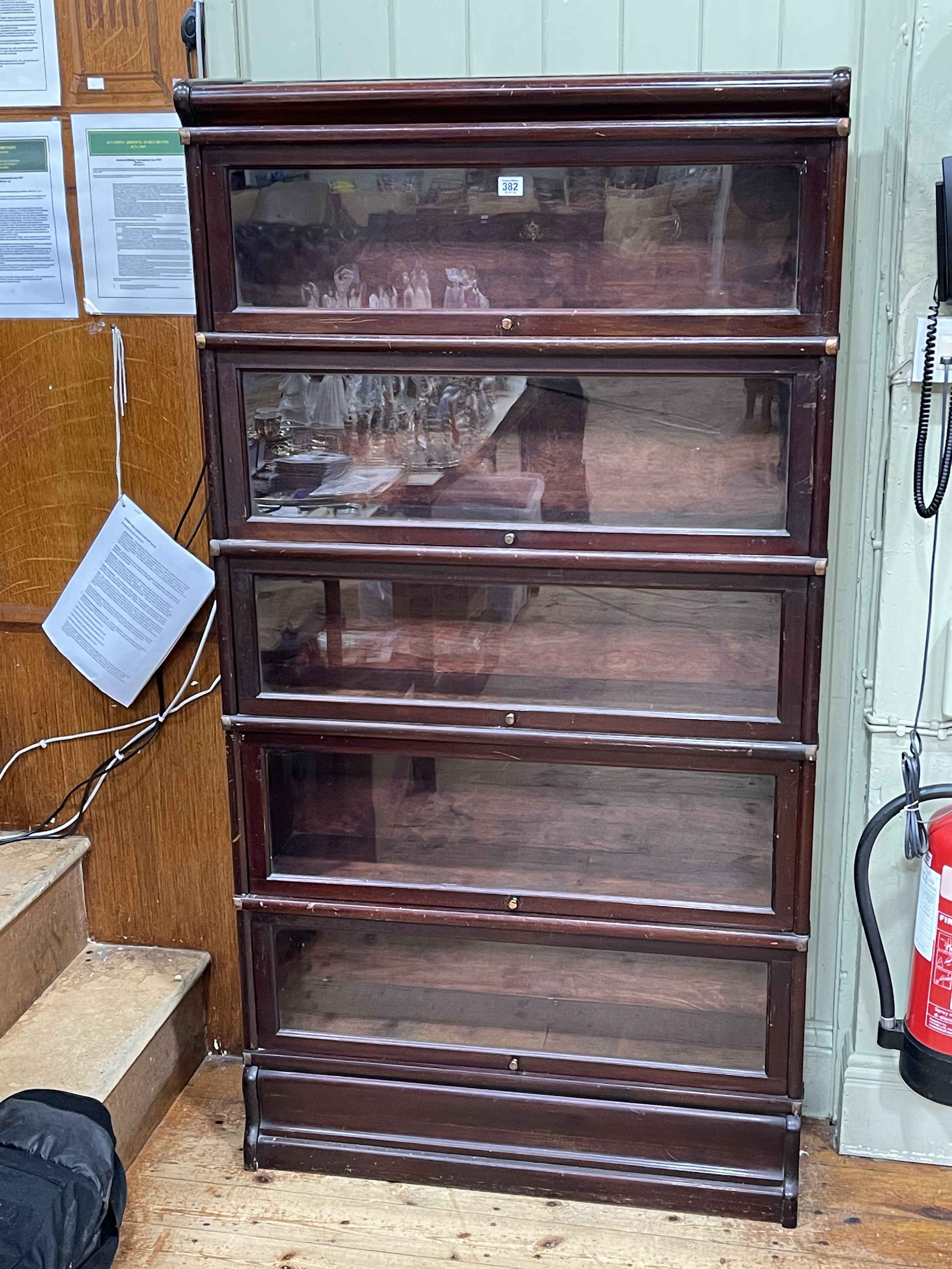 Early 20th Century Kenrick & Jefferson mahogany five height stacking bookcase, 165cm by 86.