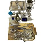 Collection of silver plated wares including decorative jug, tureen, cutlery, etc.