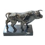 Bronzed model of a bull on marble plinth, 19cm high.