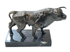 Bronzed model of a bull on marble plinth, 19cm high.