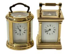 Two good quality miniature French carriage clocks with enamel dials.