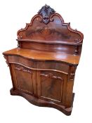 Victorian mahogany two door serpentine front chiffonier with raised shaped back,
